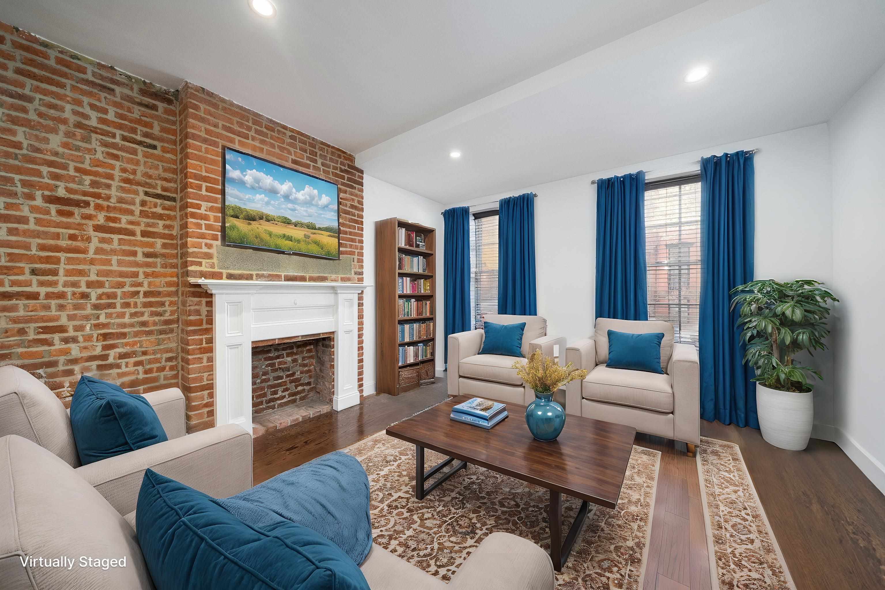 a living room with furniture fireplace and a flat screen tv