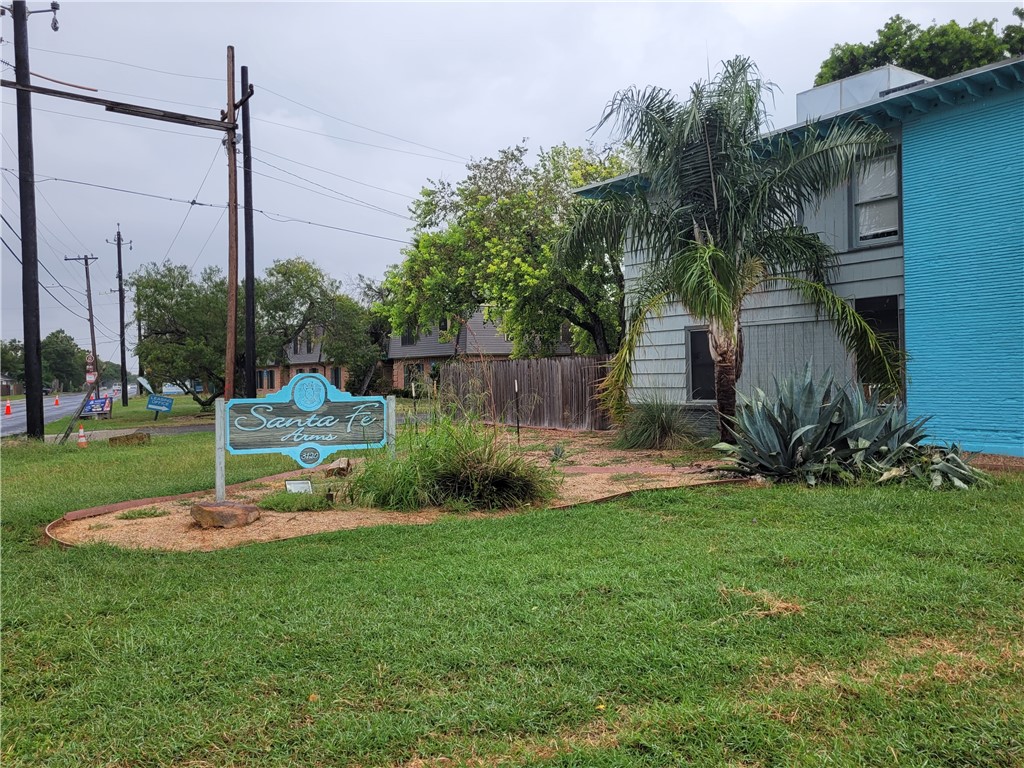 a garden view with a fountain