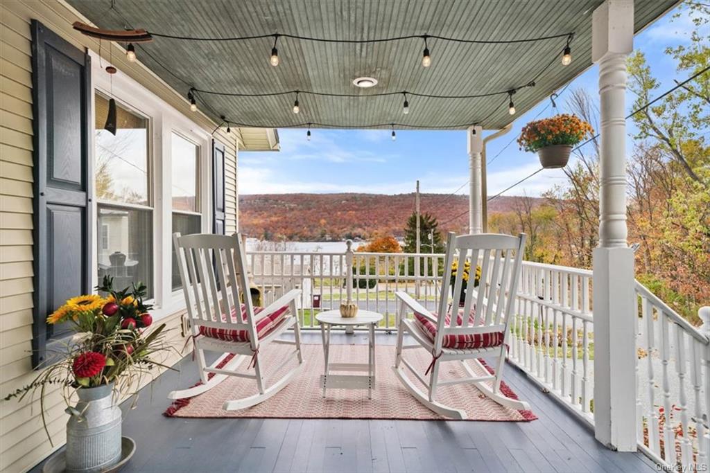 a view of a porch with furniture