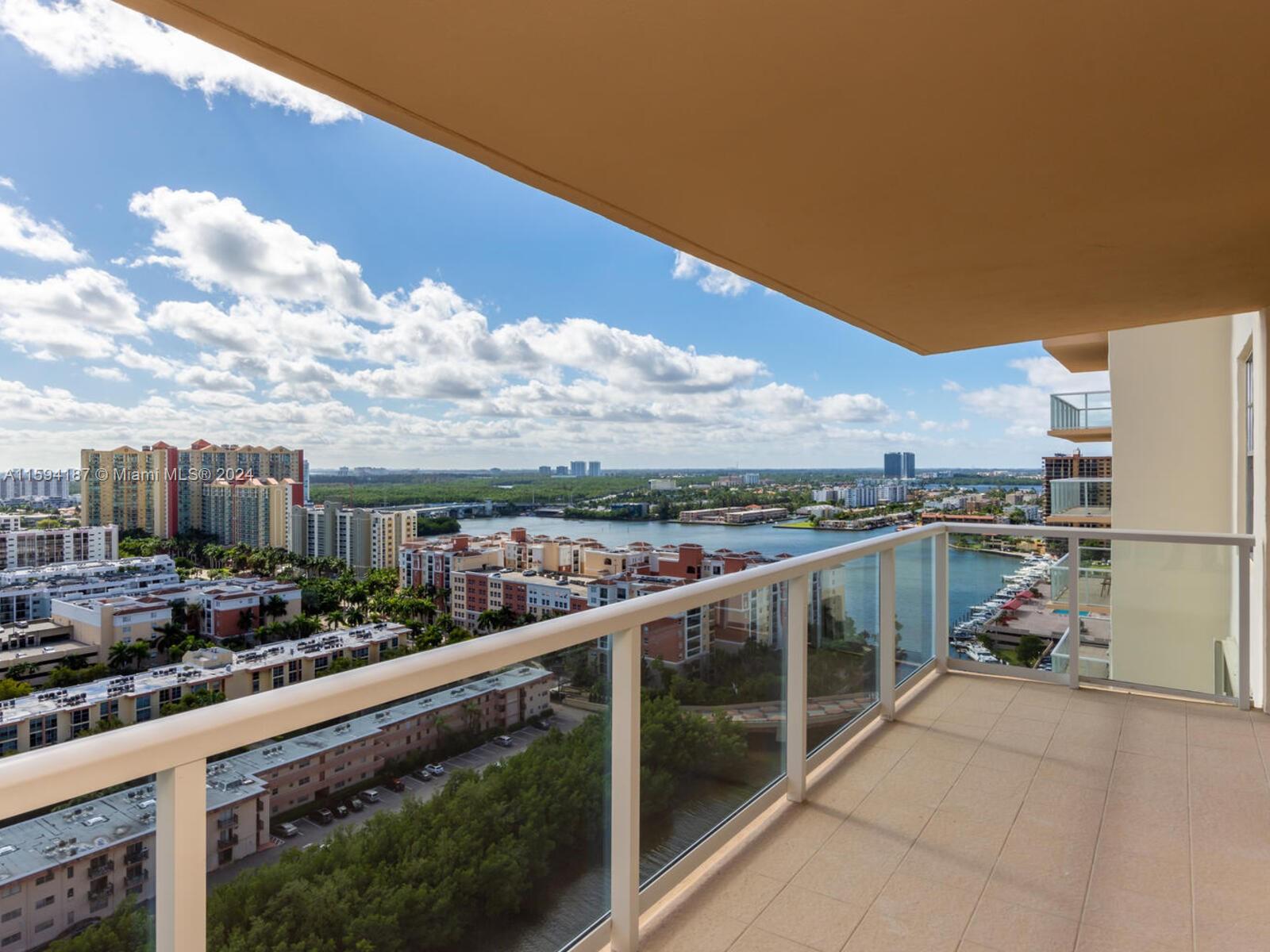 a view of a balcony with city view