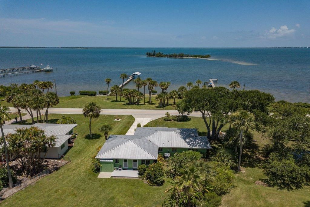 an aerial view of a houses with outdoor space