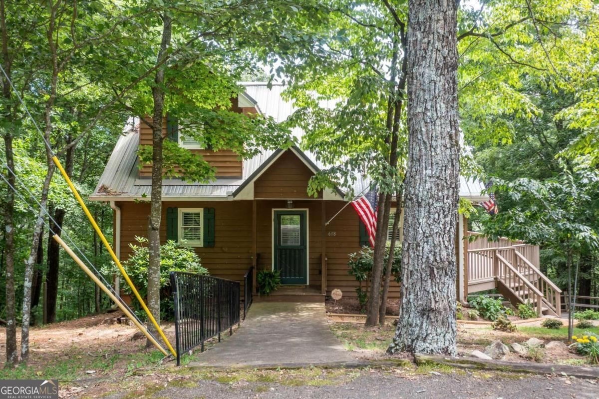 a house with a tree in front of it