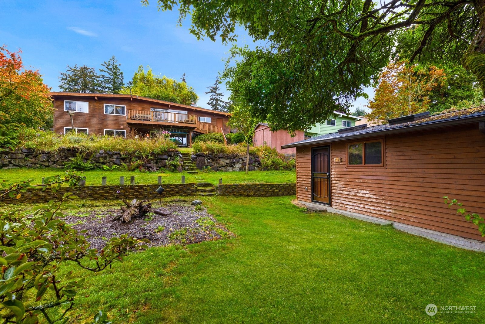 a view of a house with a yard