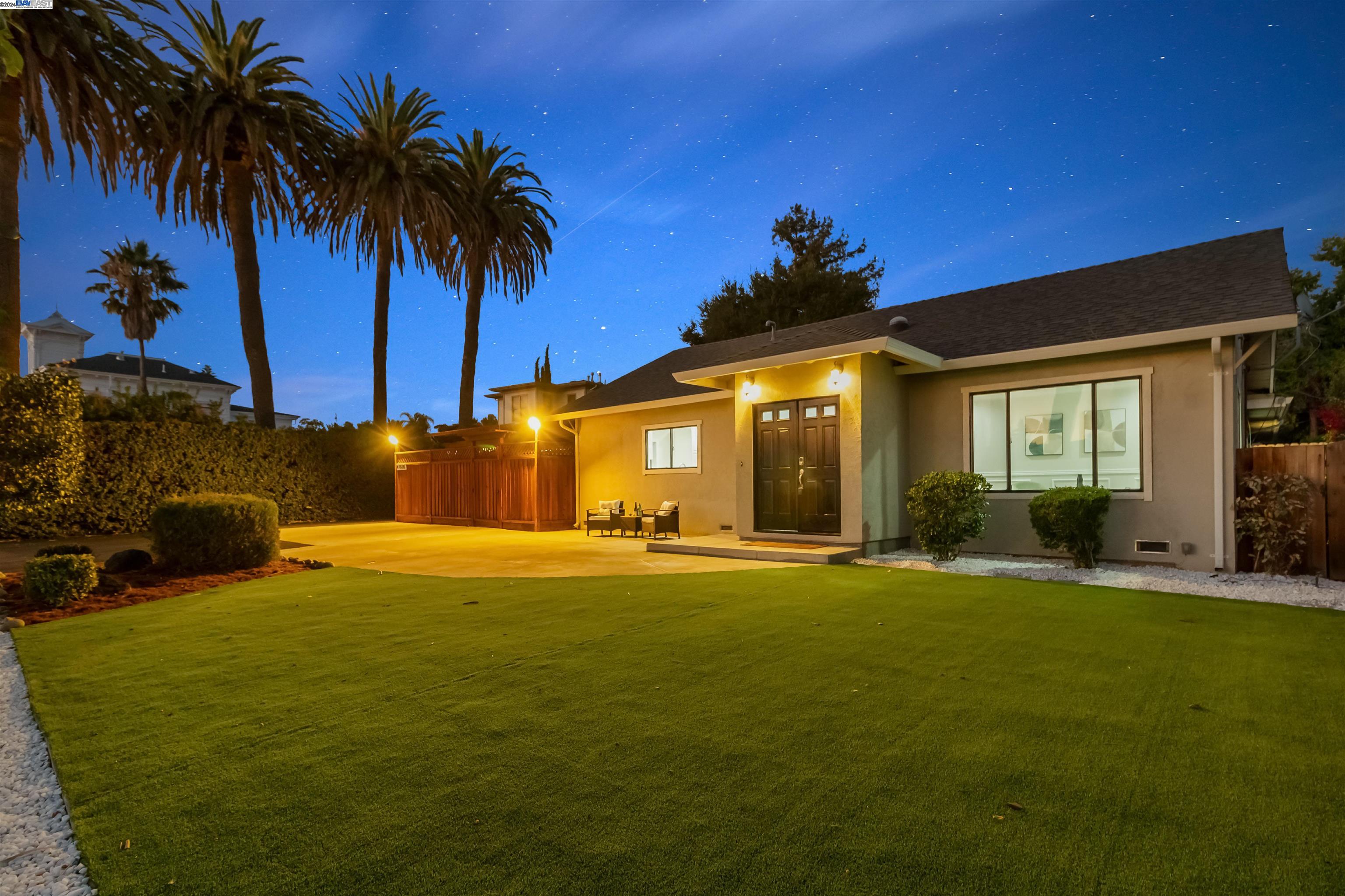 a view of a house with a swimming pool