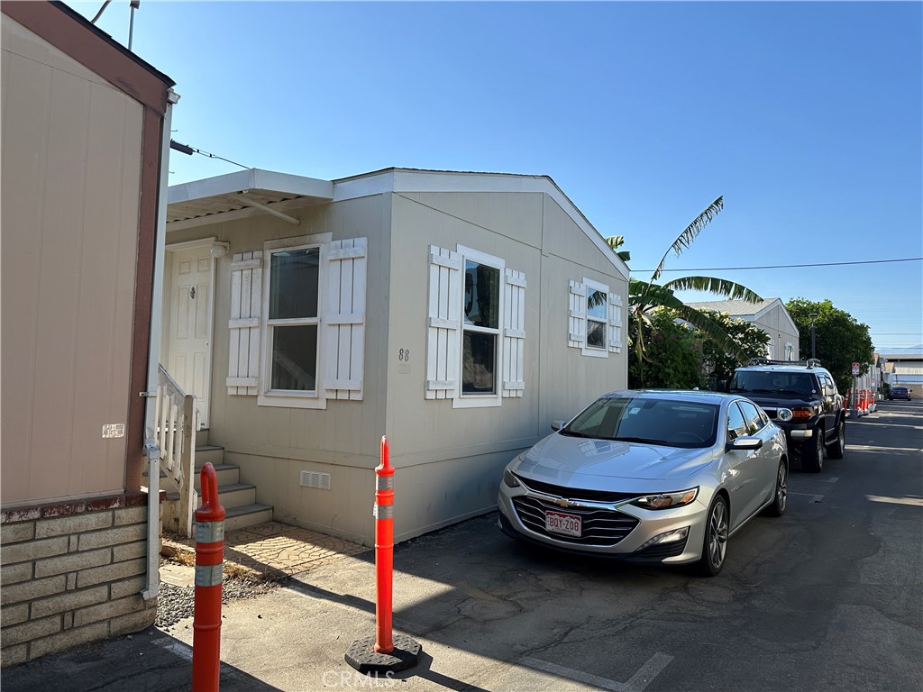 a car parked in front of a house