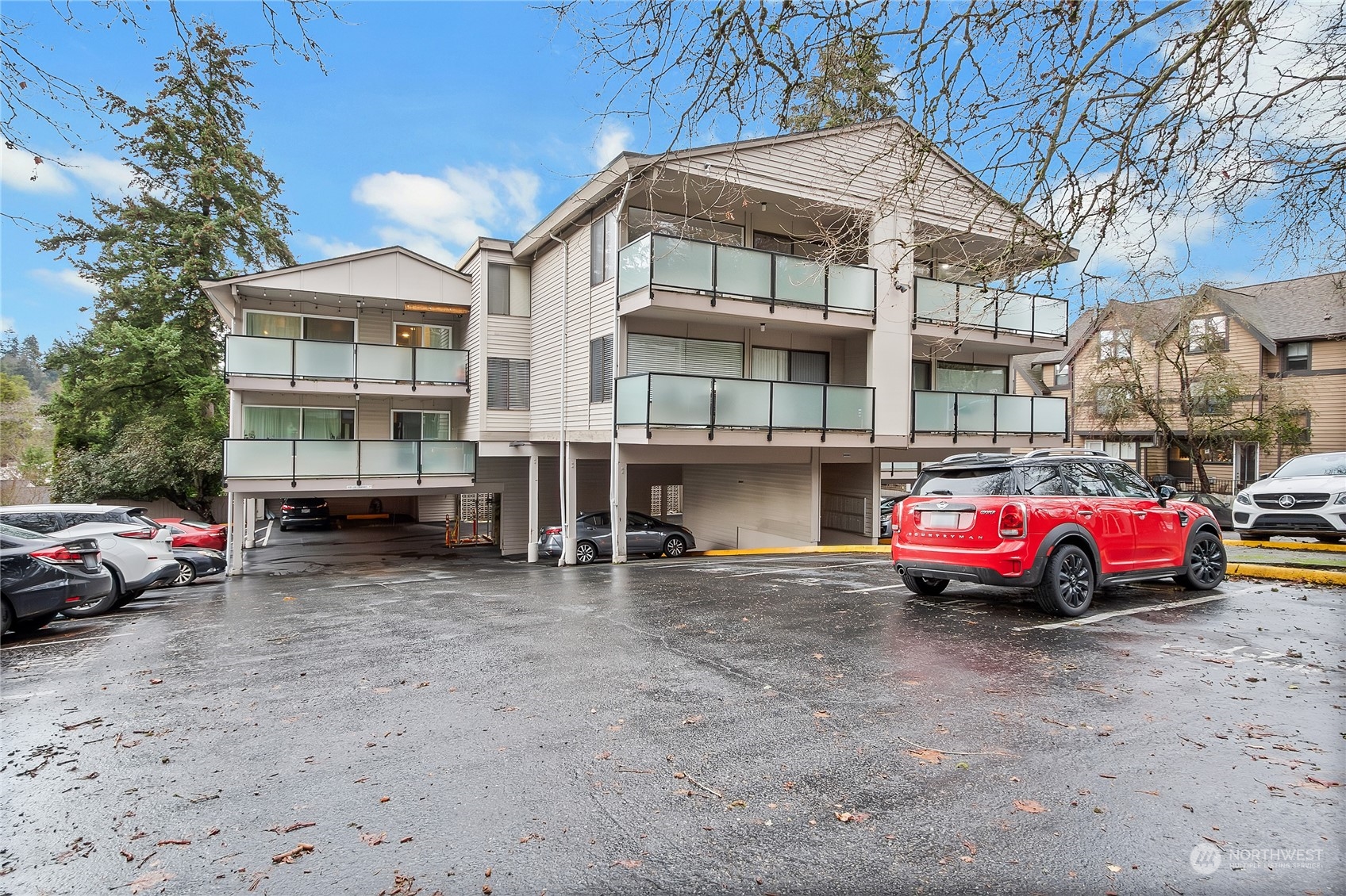 a front view of a house with parking space