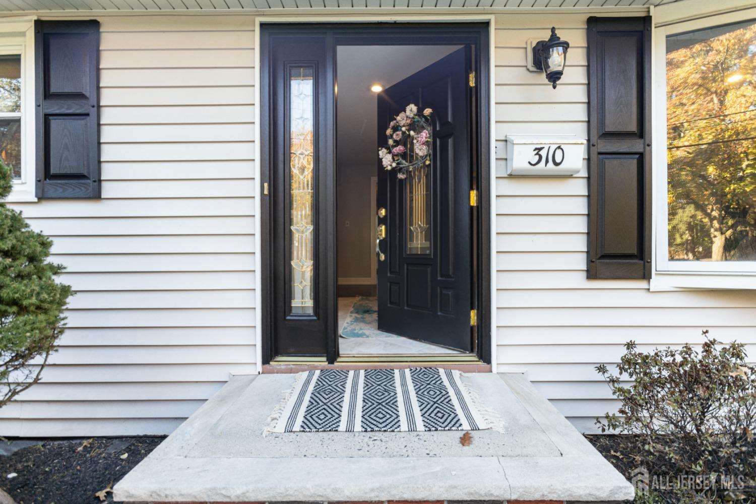 a view of a entryway door front of house