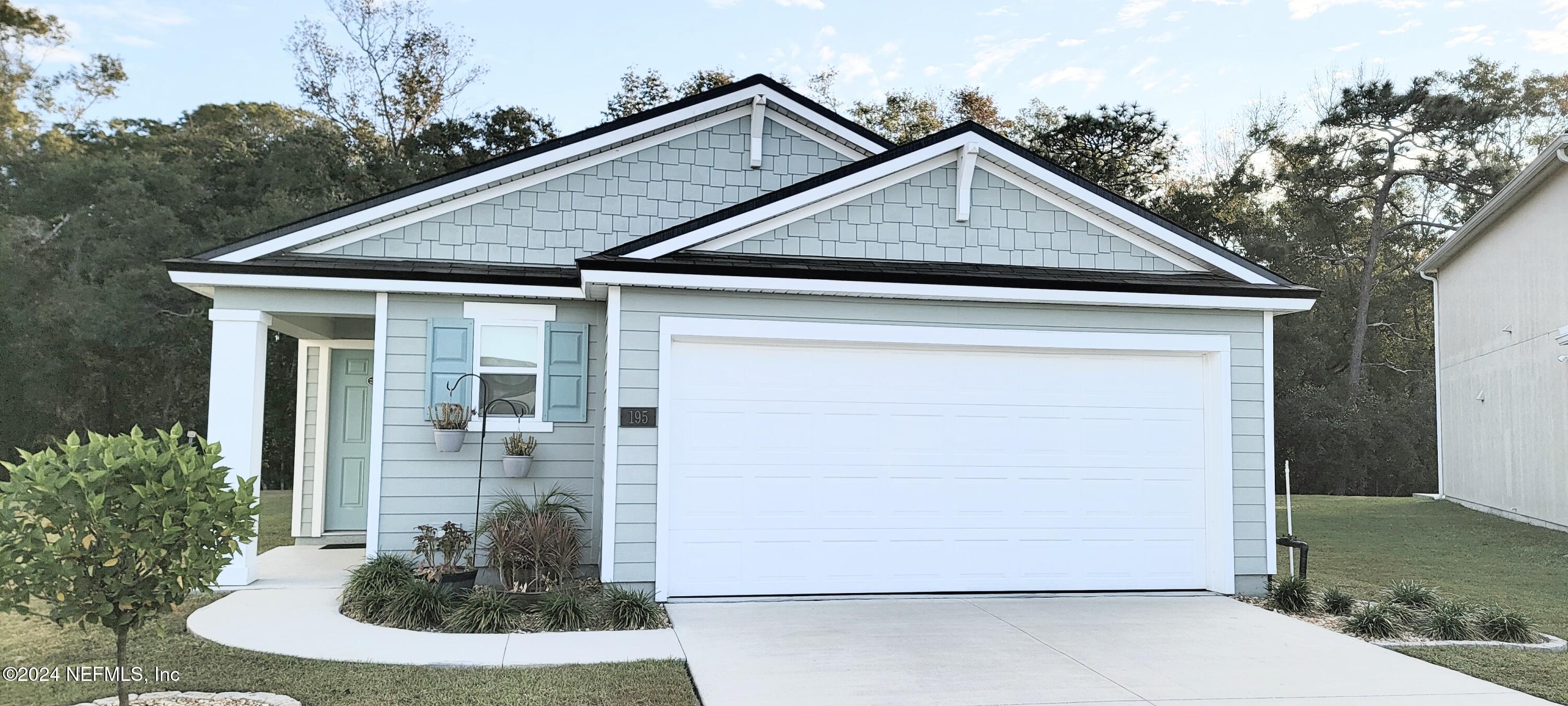 a view of a house with garage