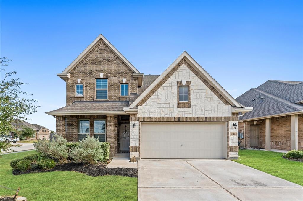 Gorgeous Stone and Brick nearly new home !!