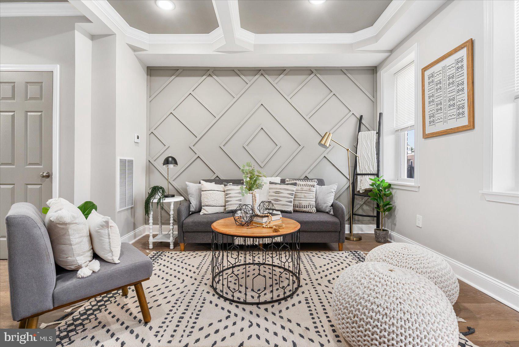 a living room with furniture and a table