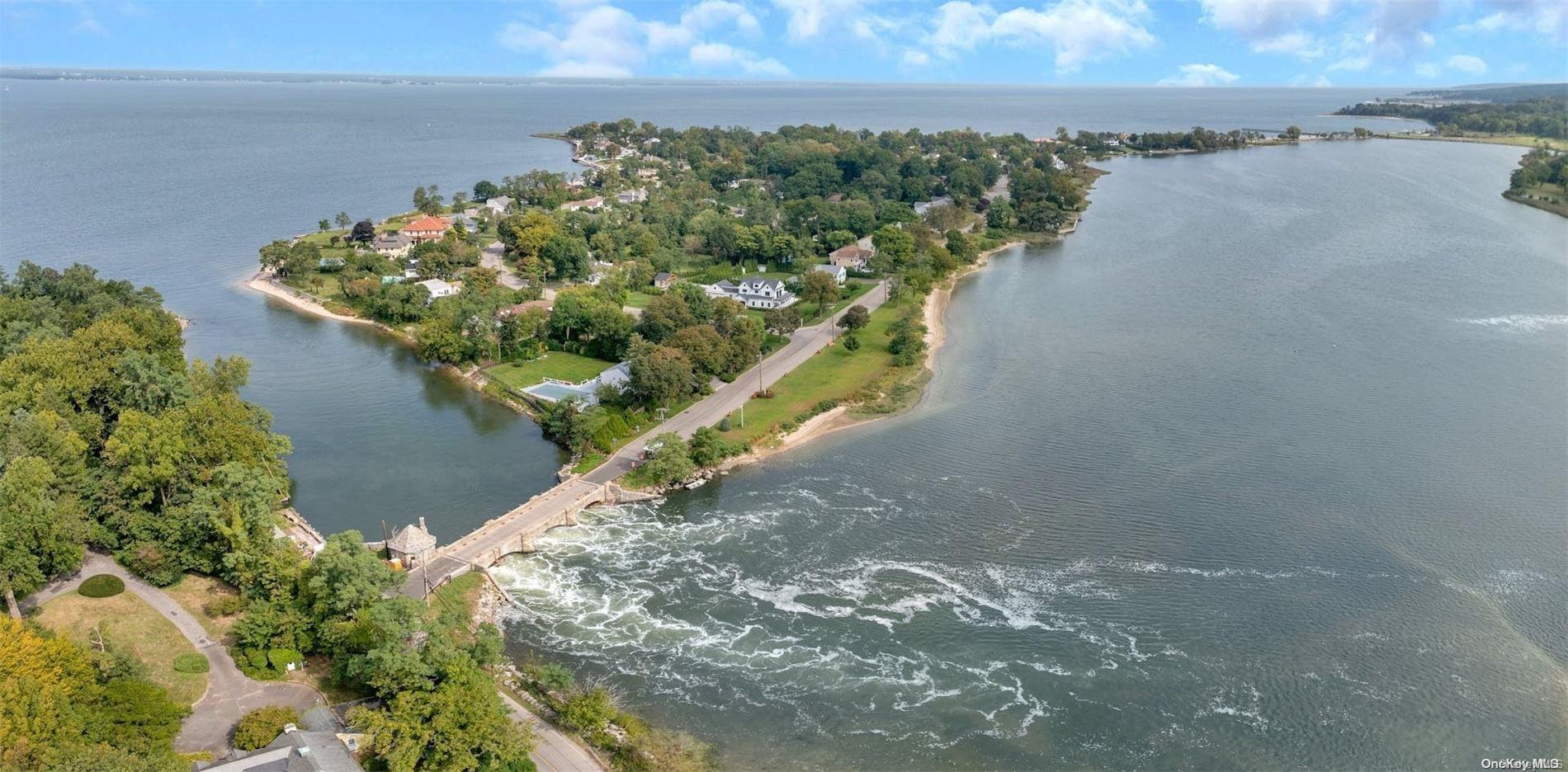 a view of a lake with a yard