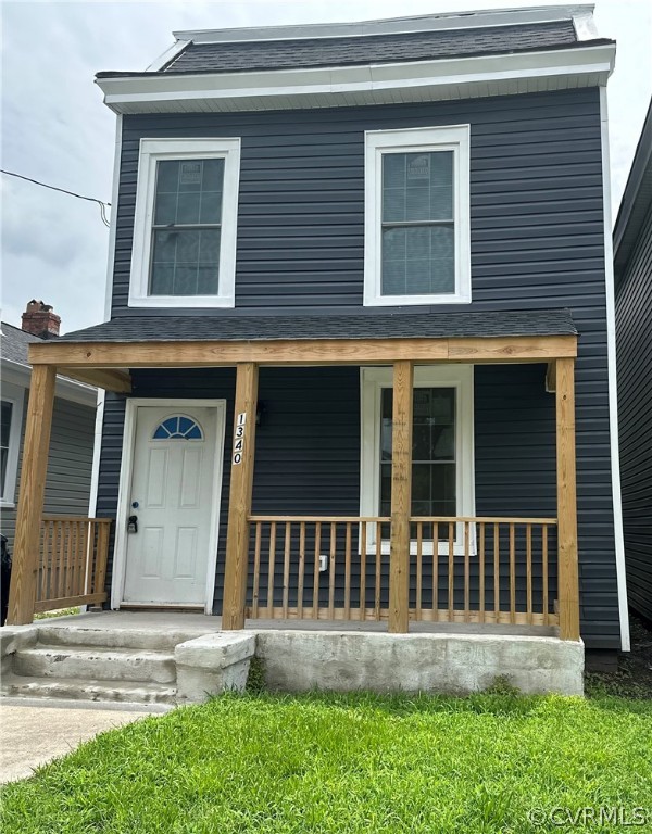 front view of a house with a yard