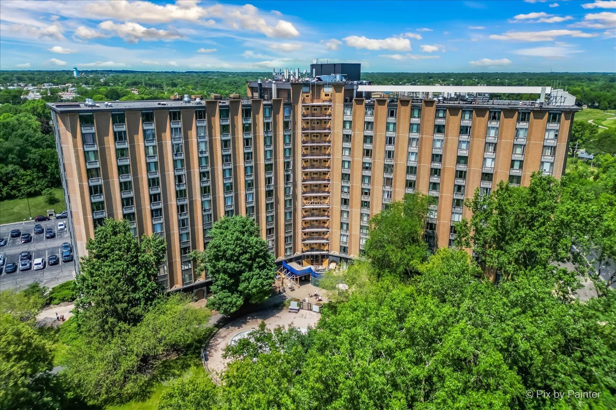 a view of a building with a garden