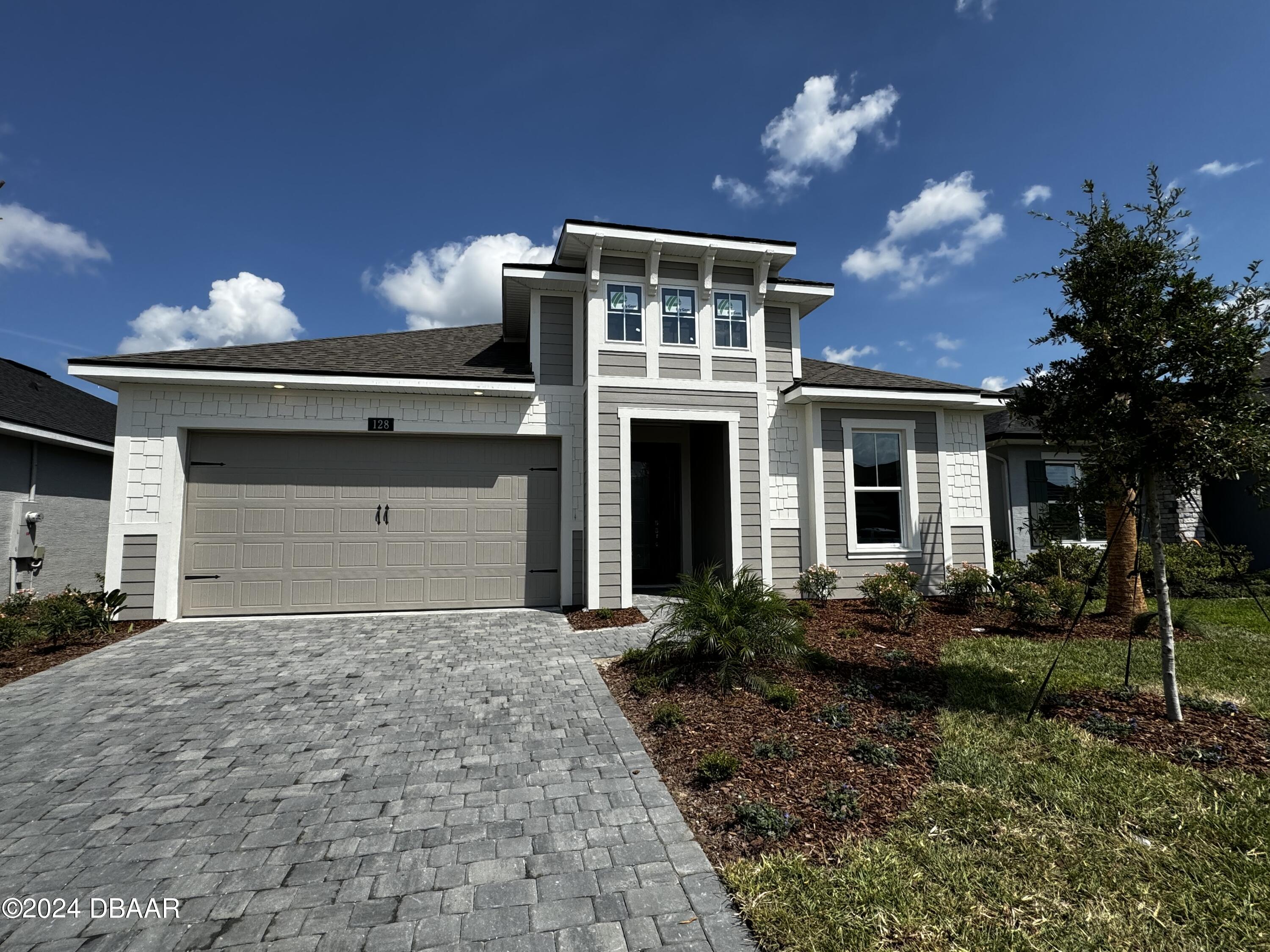 a front view of house with yard