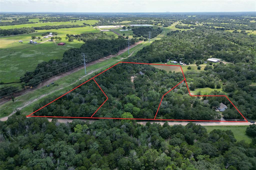 The 11 acres are being offered... Purchase all or the proposed split is an option!