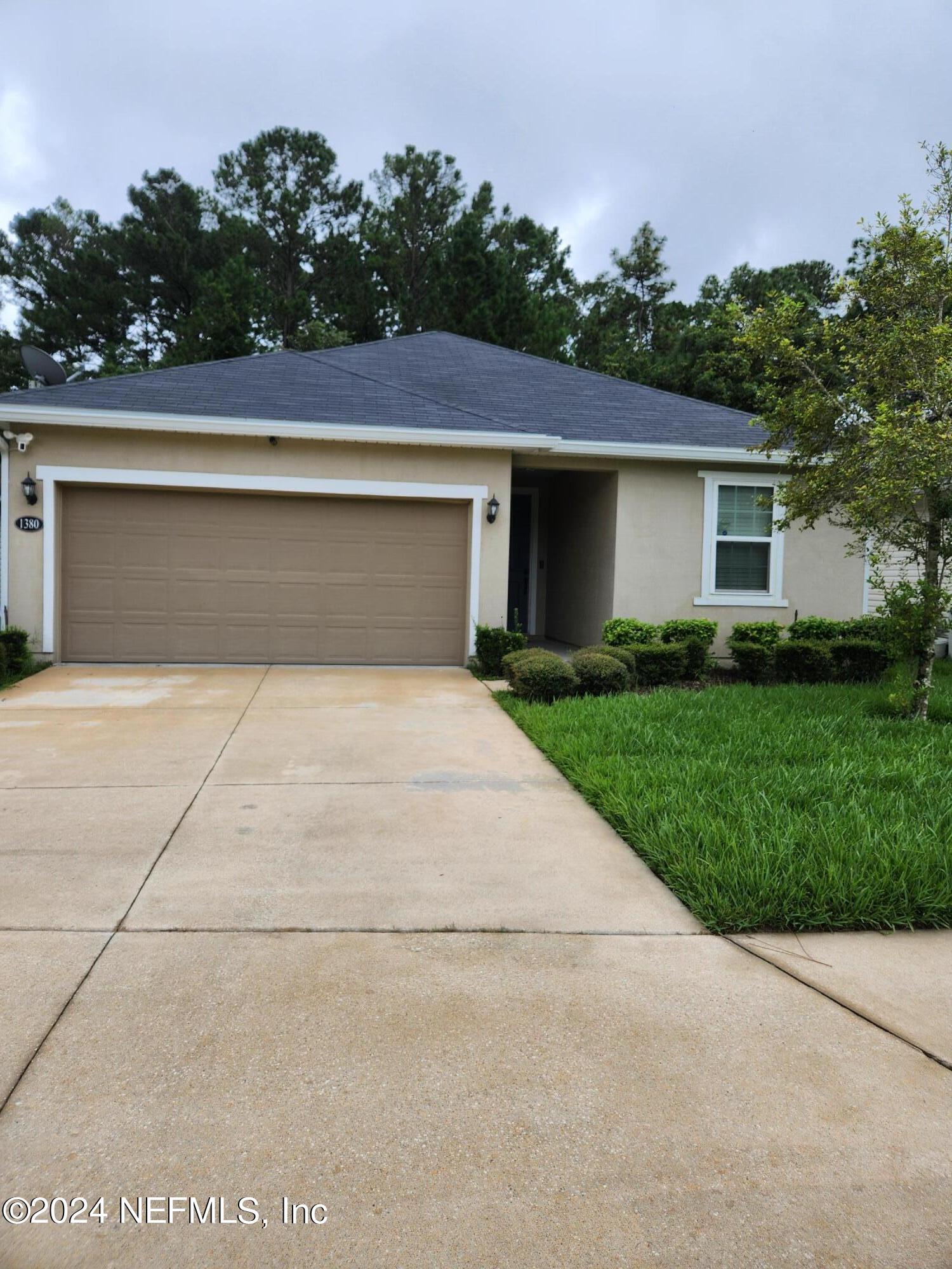 front view of house with a yard