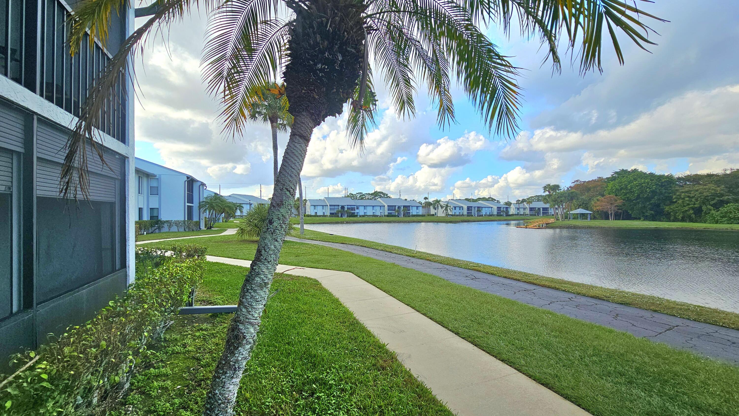 a view of a lake with a garden