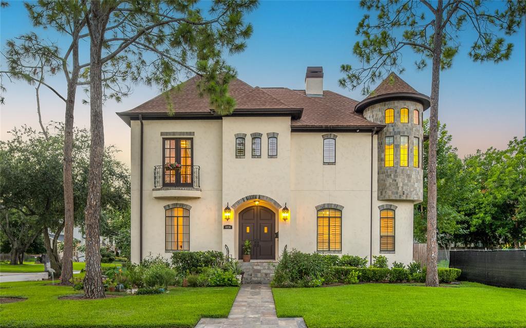 A dusk view of this fantastic home at 4930 Holly in Bellaire, Texas.