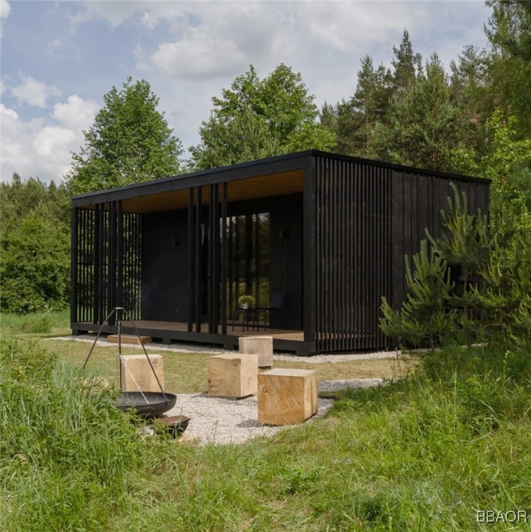 a backyard of a house with lots of green space