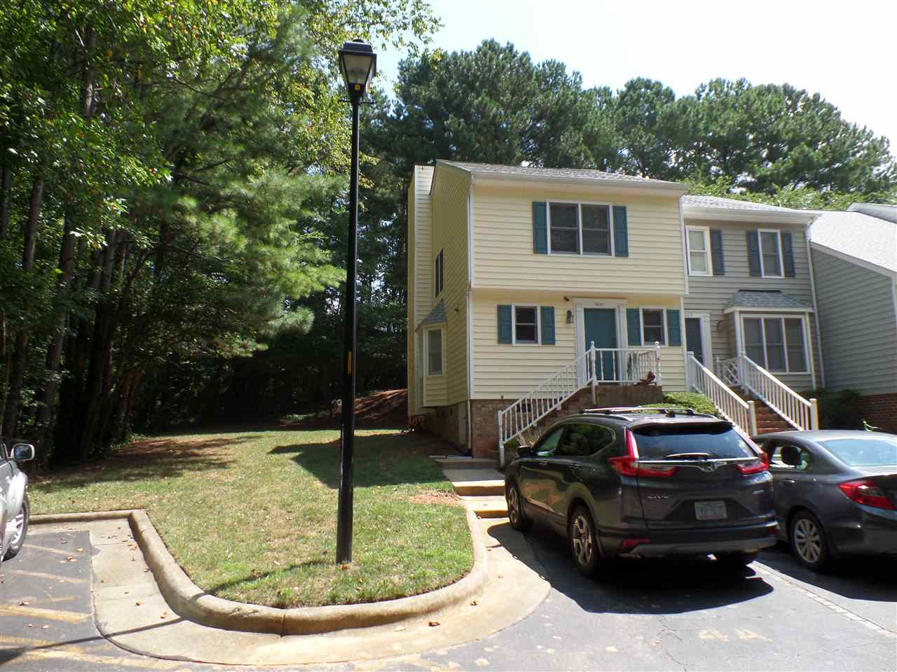 a car parked in front of a house