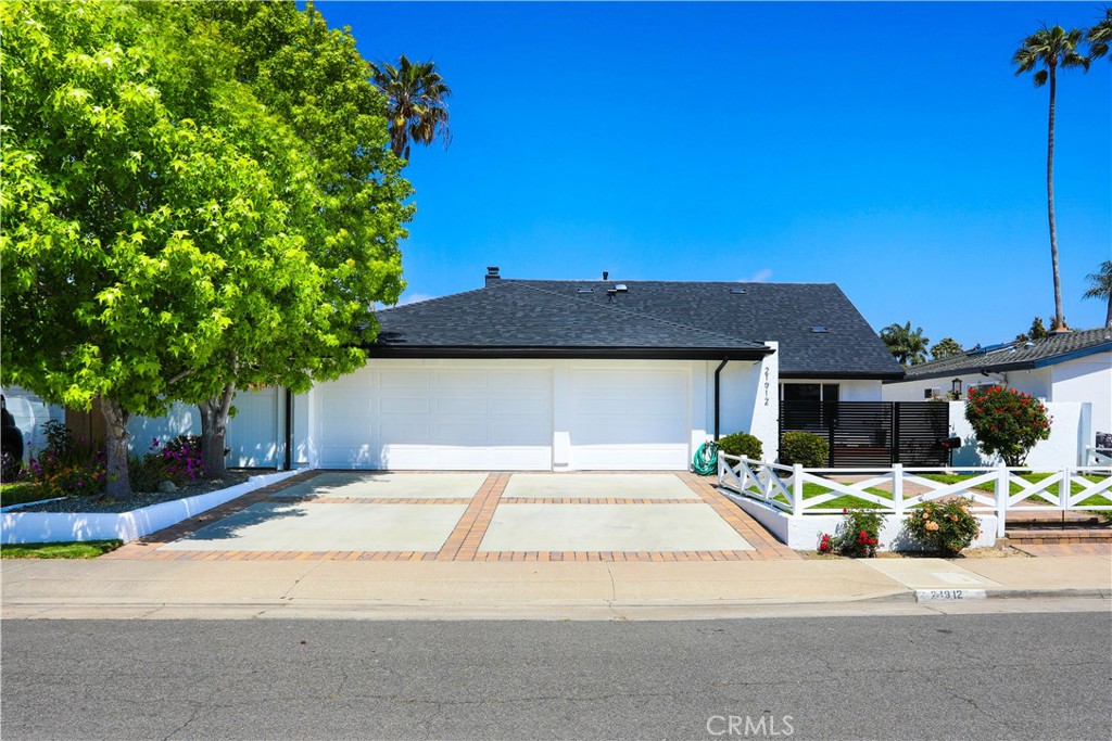 a house with trees in the background