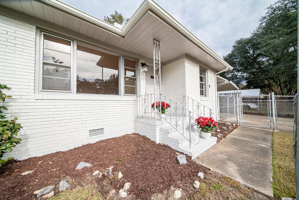 a front view of a house with a porch