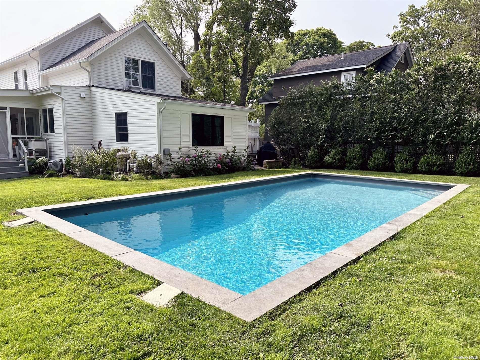 a view of outdoor space yard and swimming pool