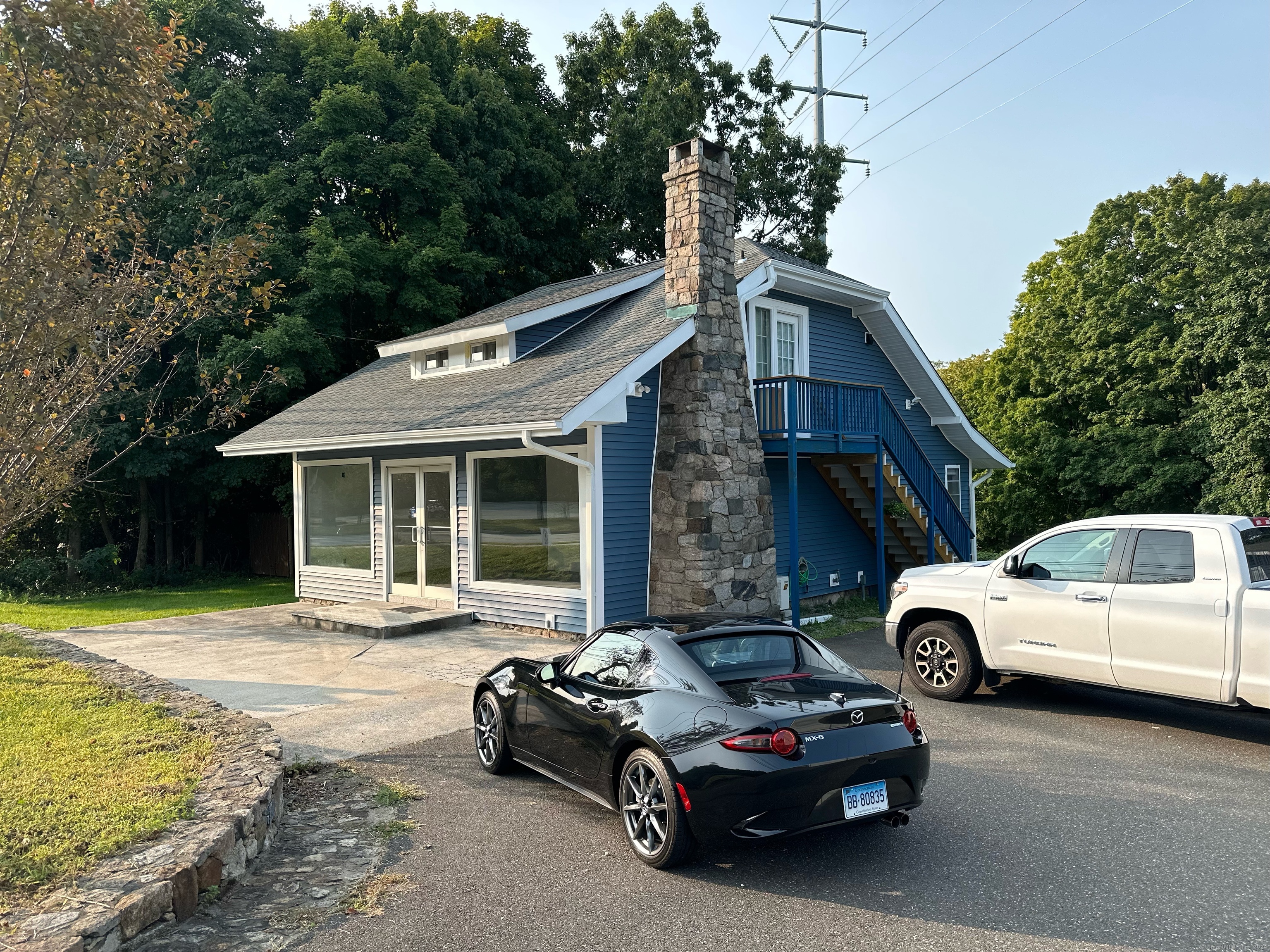 a car parked in front of a house