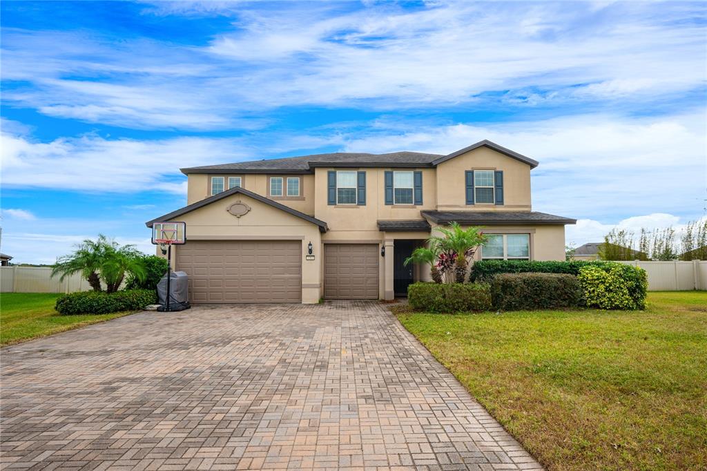 Spacious POOL HOME in the desirable Estates at Lake Pickett featuring GATED ACCESS, your CHOICE OF PRIMARY SUITES (one up and one down!), light and bright OPEN CONCEPT LIVING, a massive .68 ACRE LOT and community ACCESS TO LAKE PICKETT!