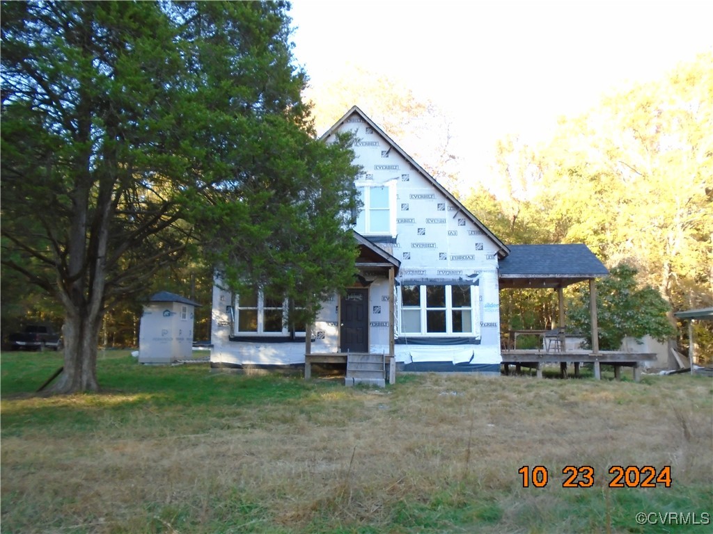 front view of a house with a yard