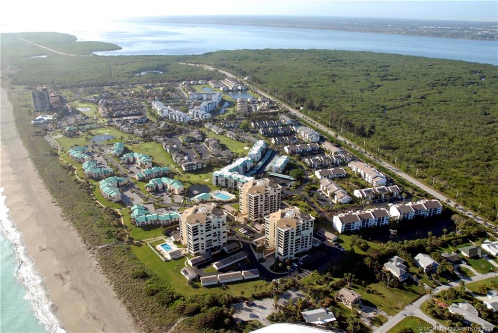 a view of a city with an ocean