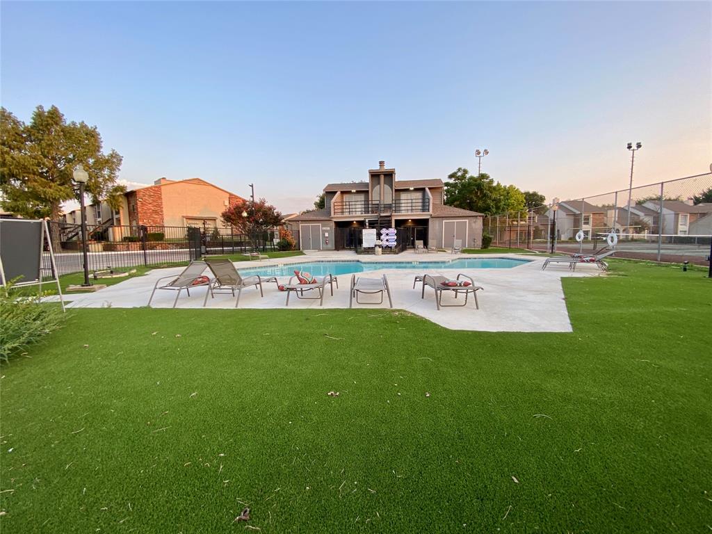 a view of a house with a big yard