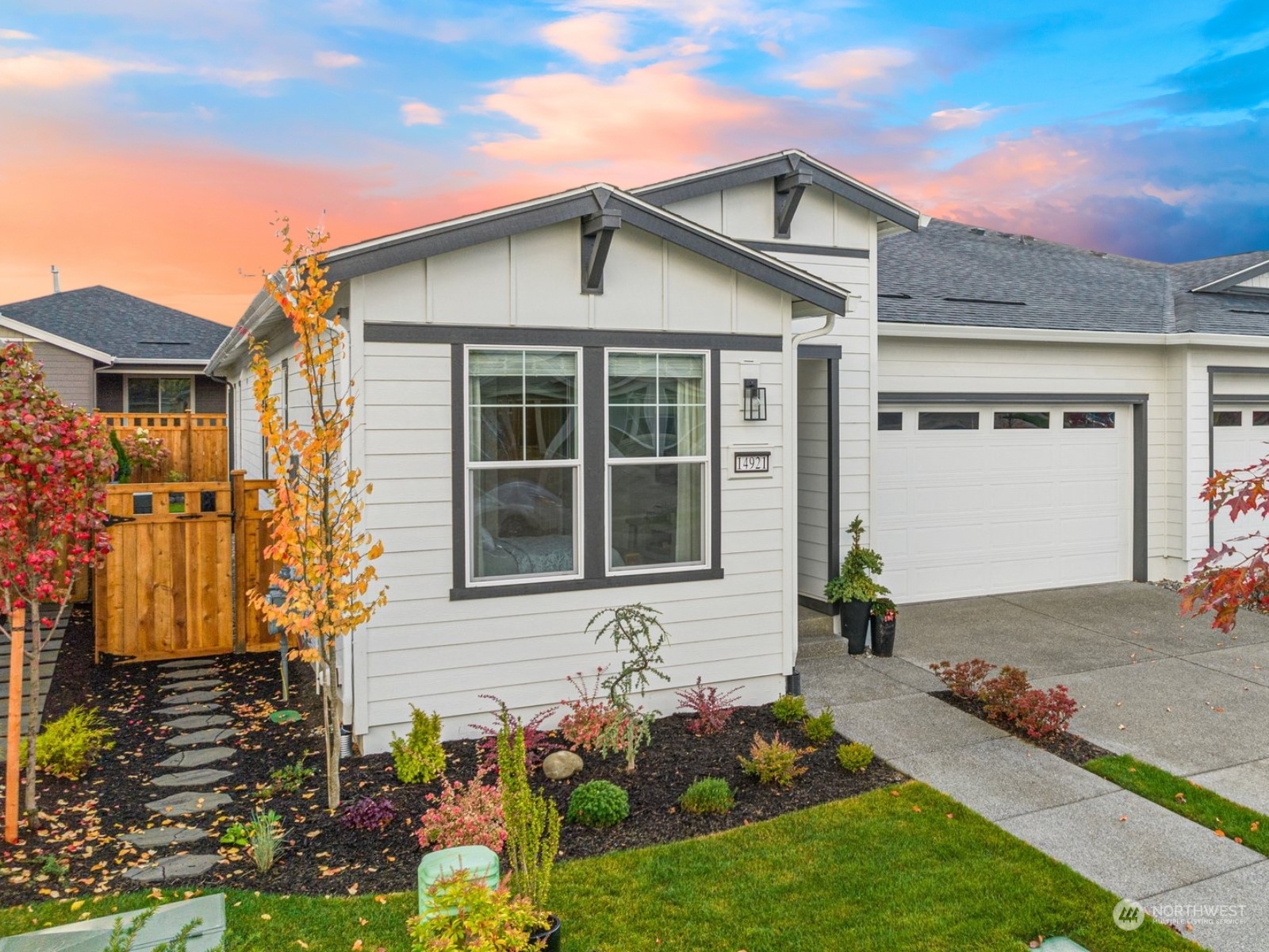 front view of a house with a yard