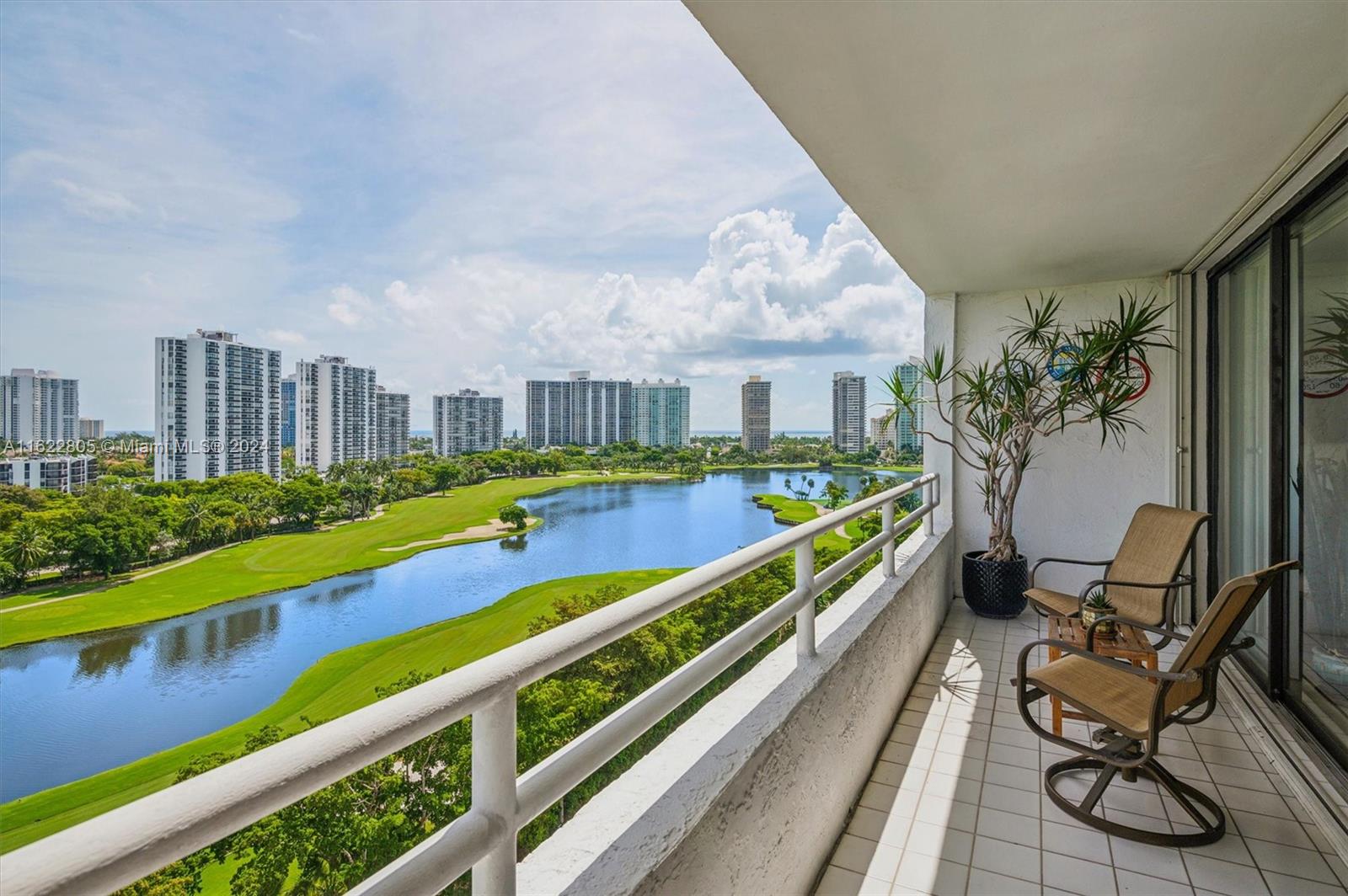 a view of swimming pool with chairs in patio