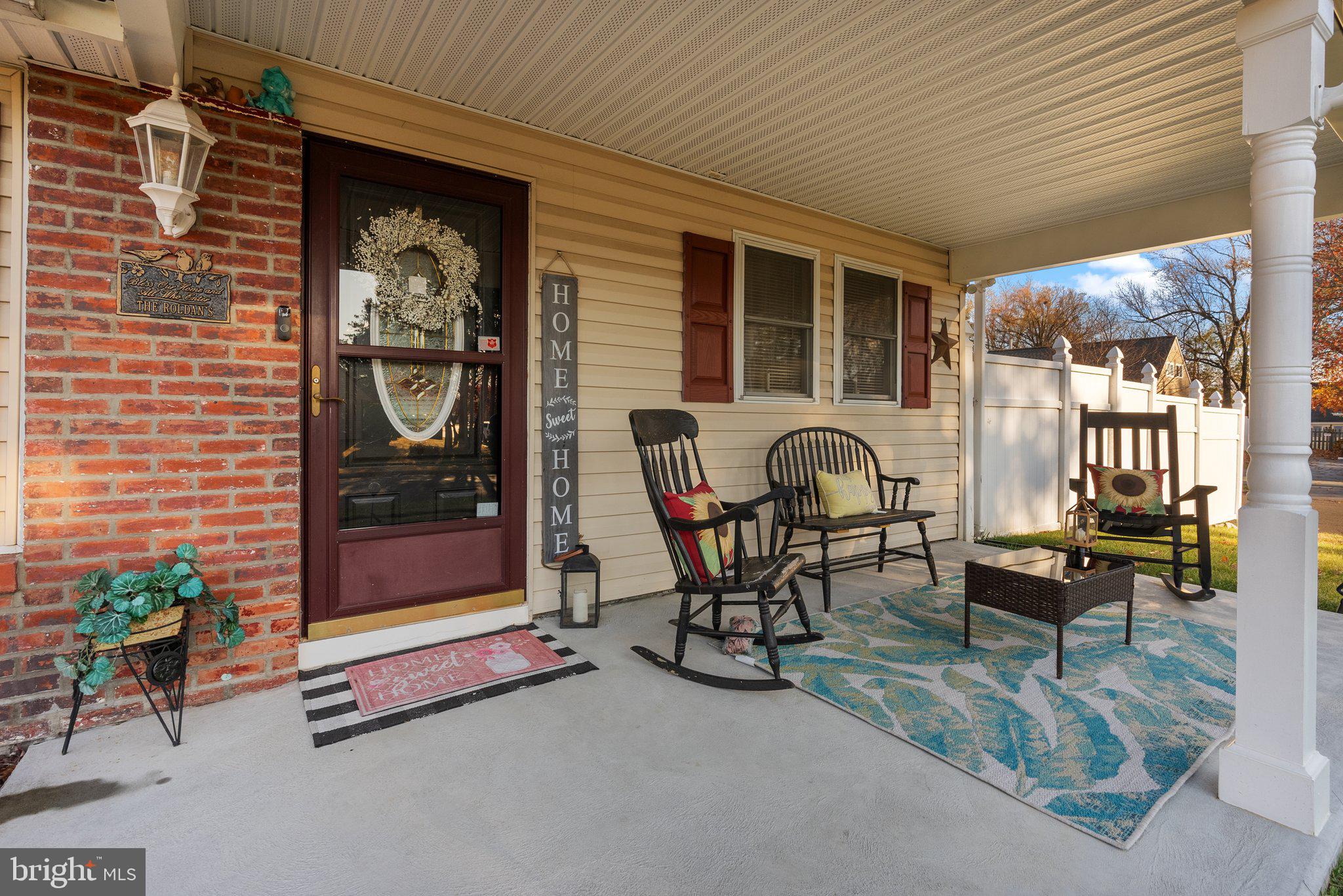 a living room with furniture and a gate