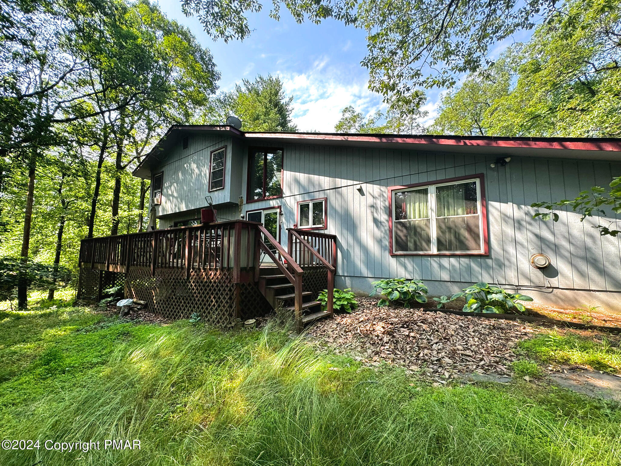 a view of a barn in the back yard