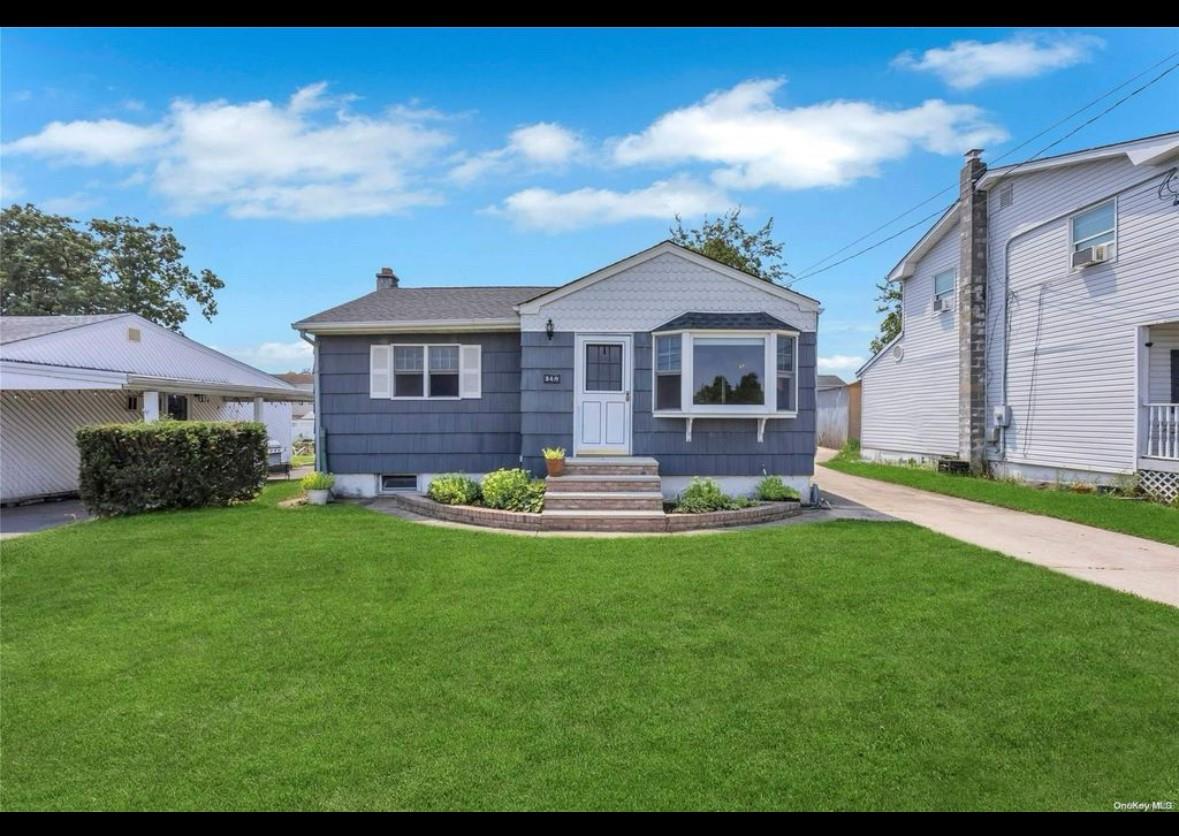 View of front of home with a front yard