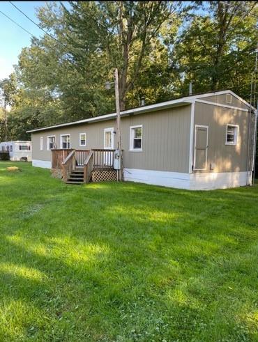 The mobile home is on a block foundation with a bump out for the family room. Well and Septic, Propane Heat, Penn Electric. Sits on 2 parcels