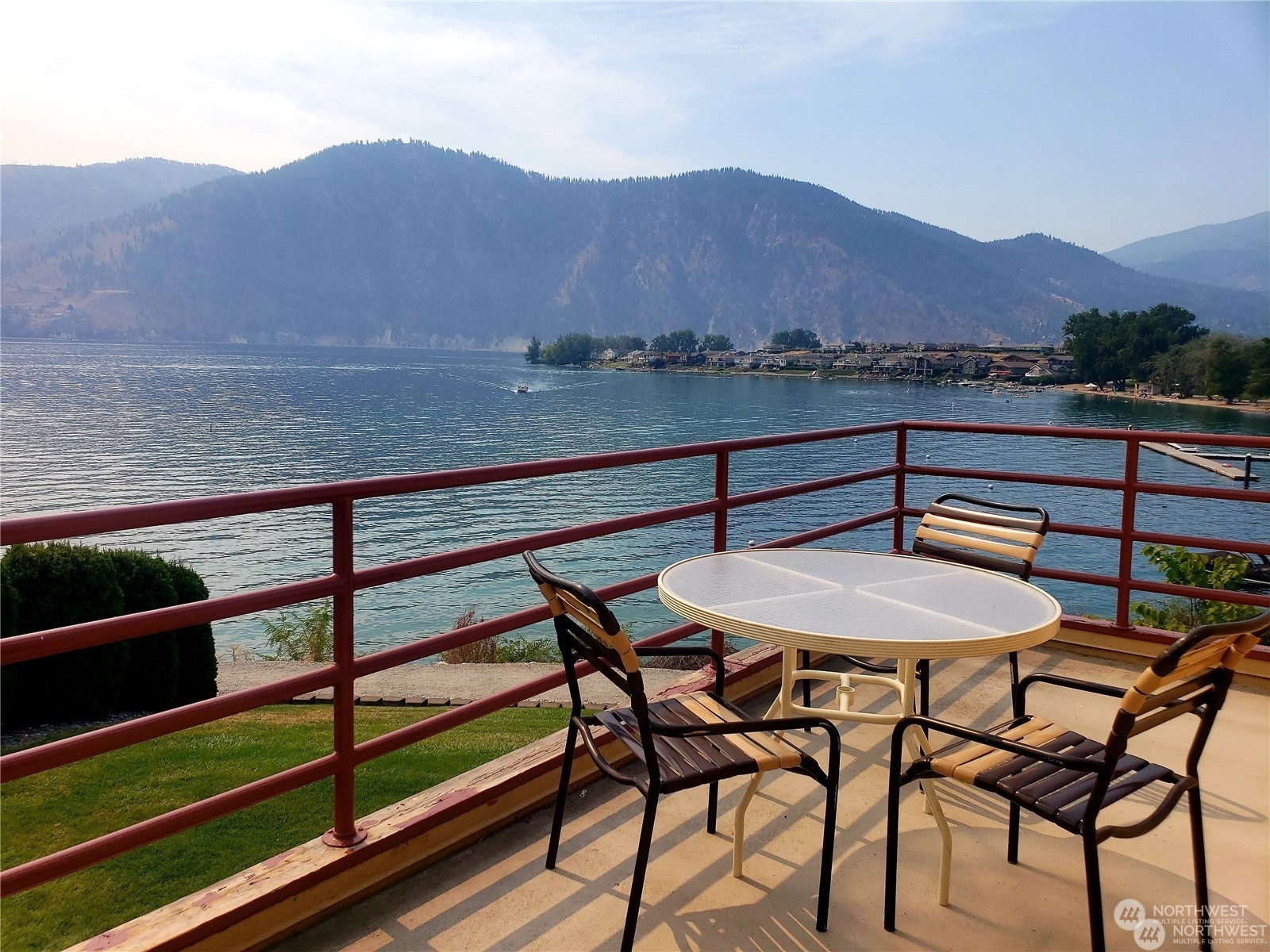 a view of a chairs and table on the terrace