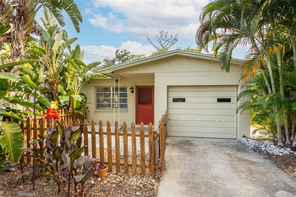 a front view of a house with a garage