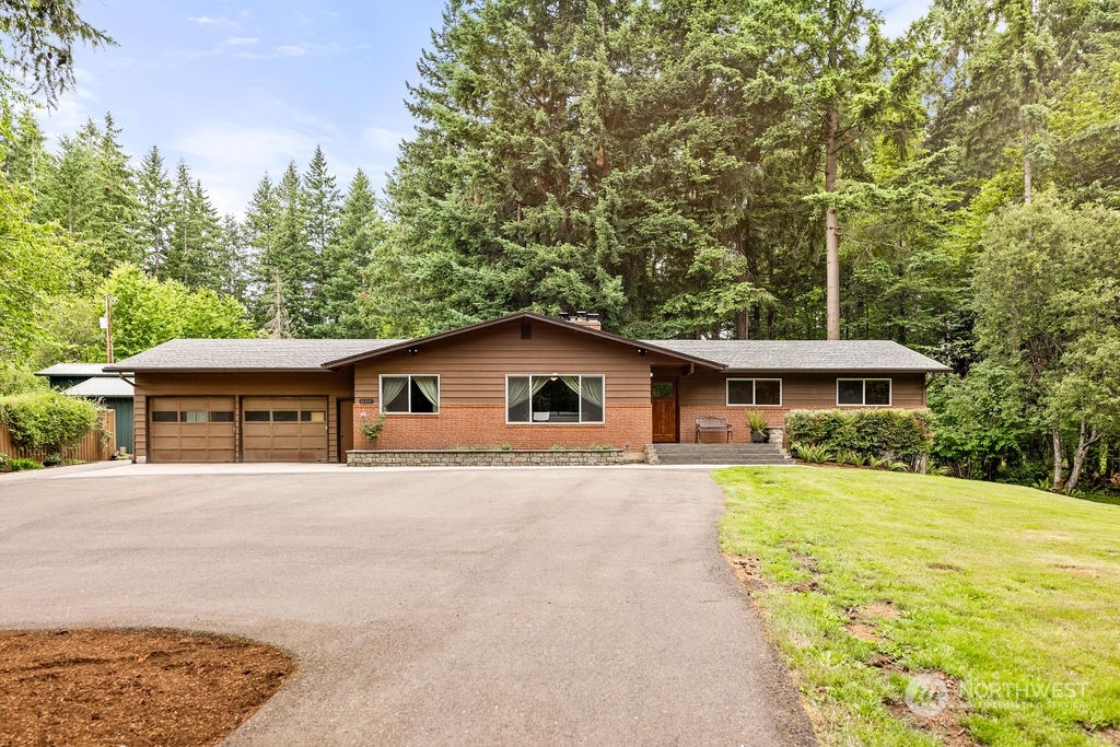 a house with trees in the background