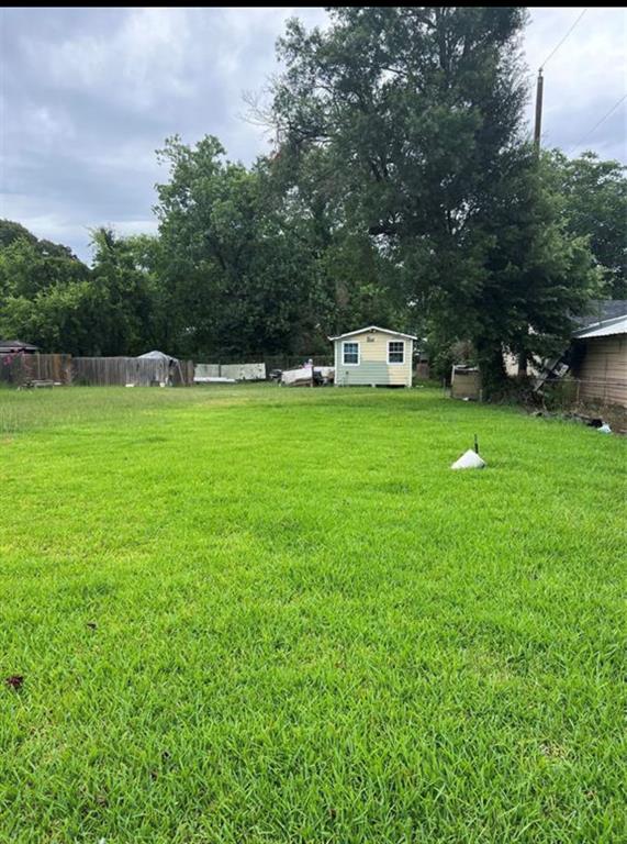 a house view with a play ground in front of it