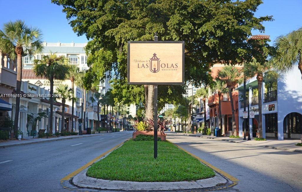 a sign on the side of a street