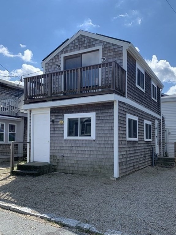 a view of a house with a deck