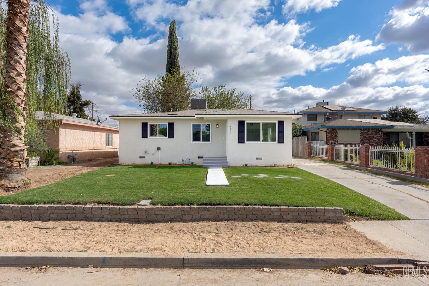 front view of house with a yard