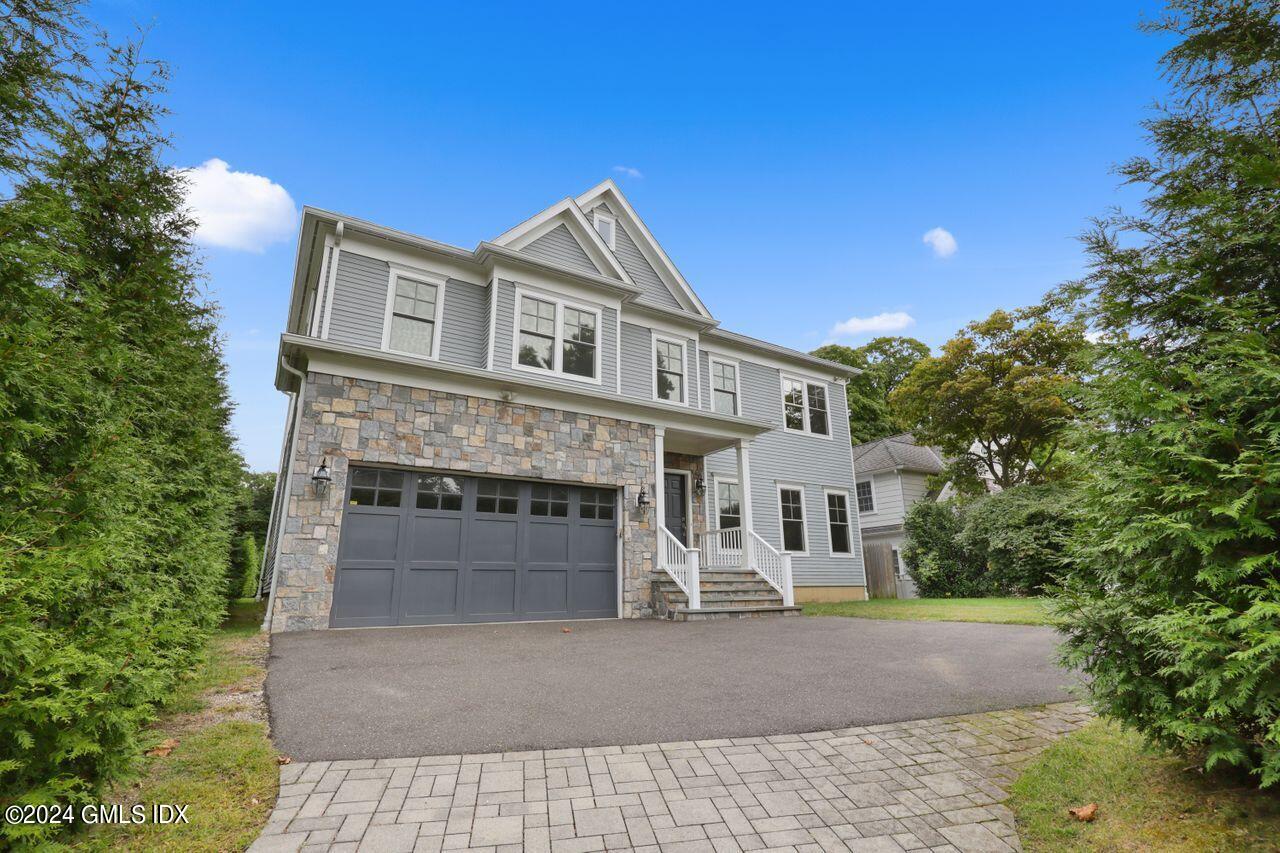 a view of house and outdoor space with yard