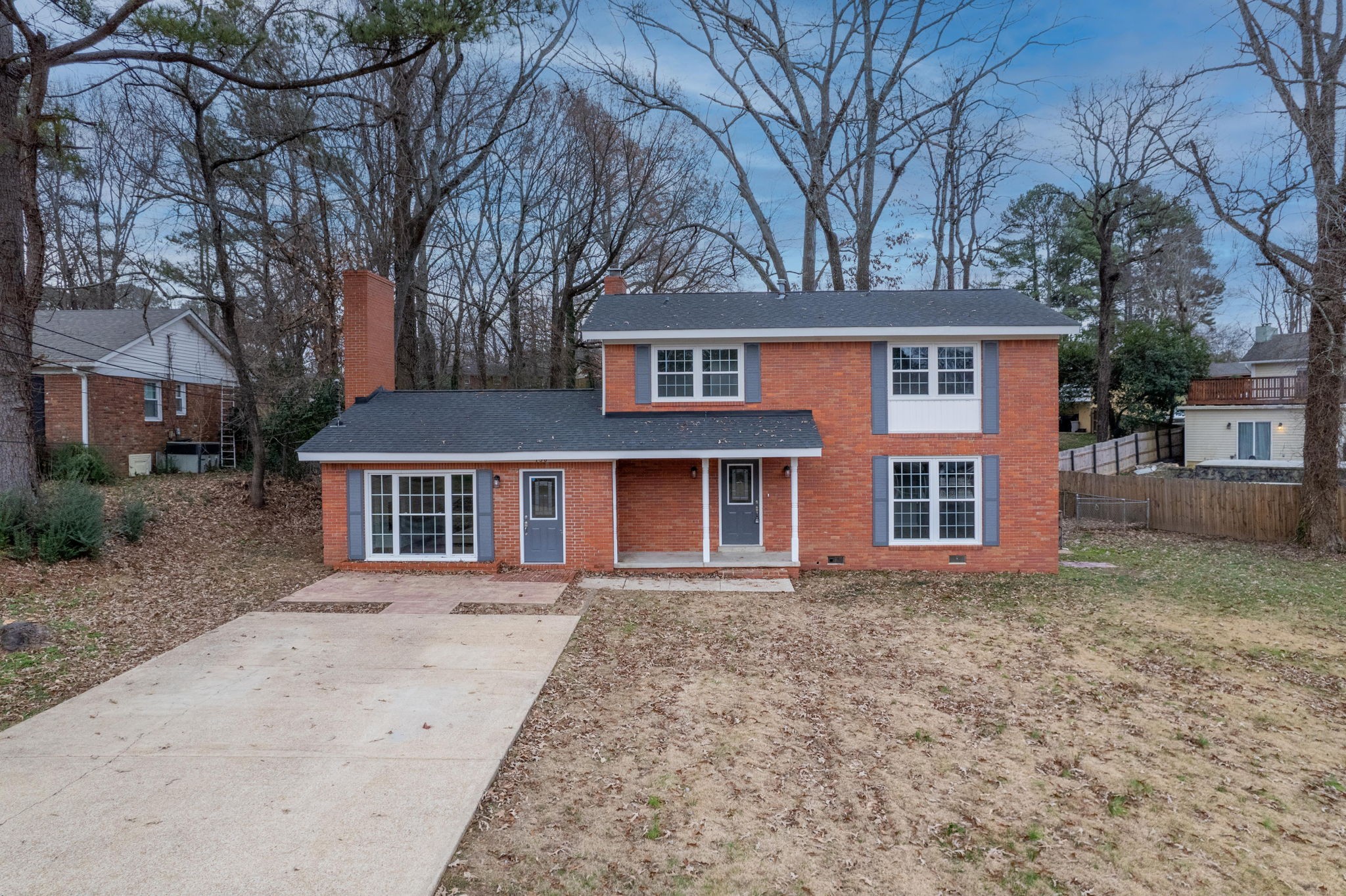 front view of a house with a yard