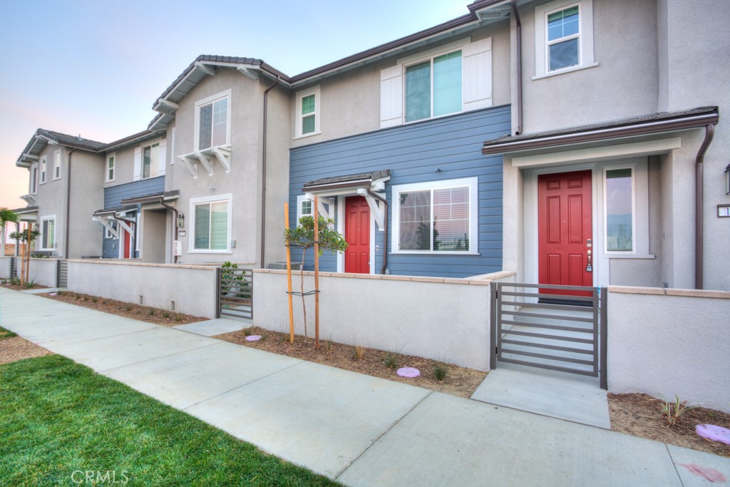 a front view of a house with a garage