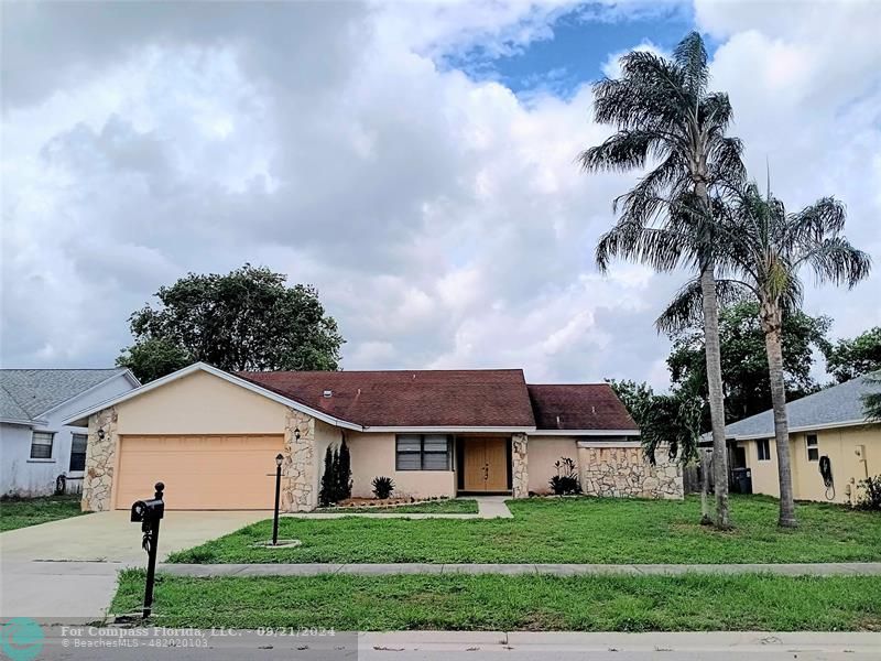 front view of house with a yard