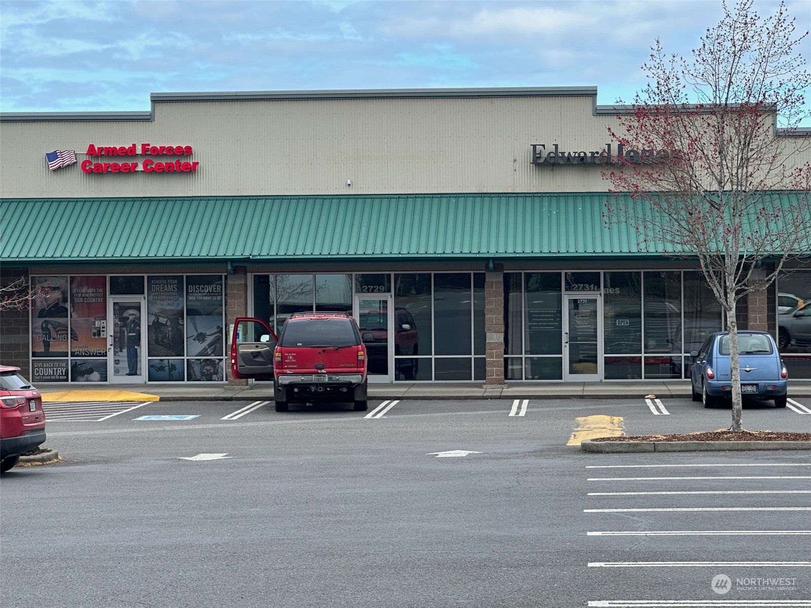 a car parked in front of a building